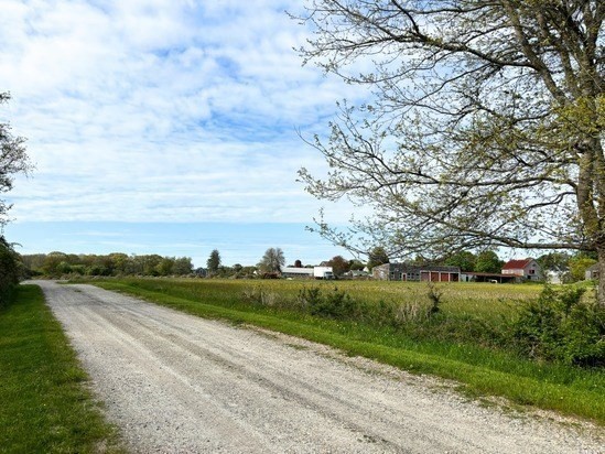 482 Smith Neck Road Dartmouth, MA 02748 - Photo 2 of 40 a view of a yard with an ocean view