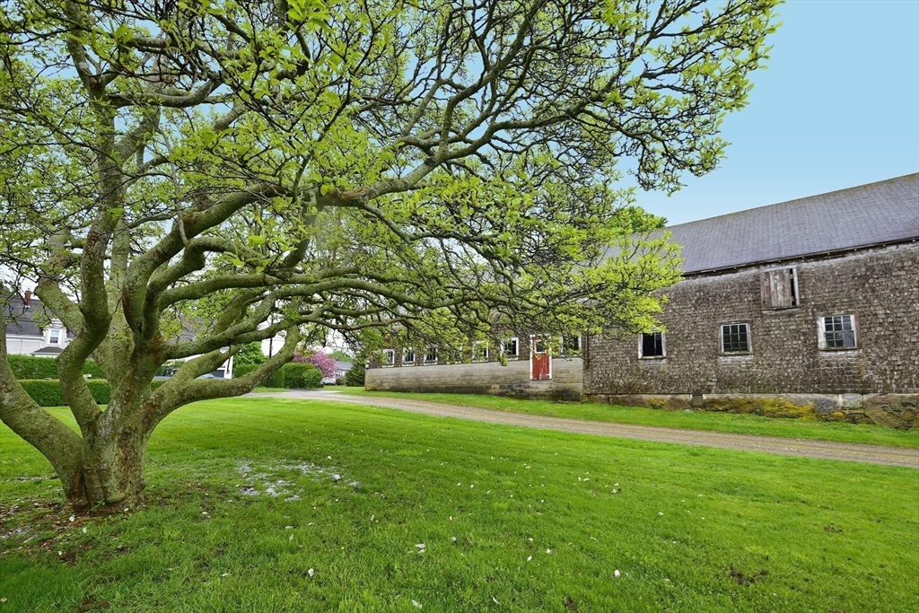 482 Smith Neck Road Dartmouth, MA 02748 - Photo 22 of 40 a garden view with a sitting space