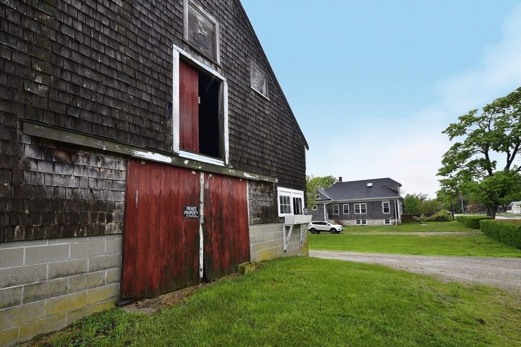482 Smith Neck Road Dartmouth, MA 02748 - Photo 27 of 40 a view of a house with a yard
