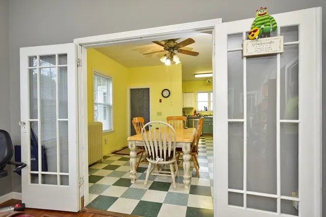 a kitchen with stainless steel appliances a stove a sink and a cabinets
