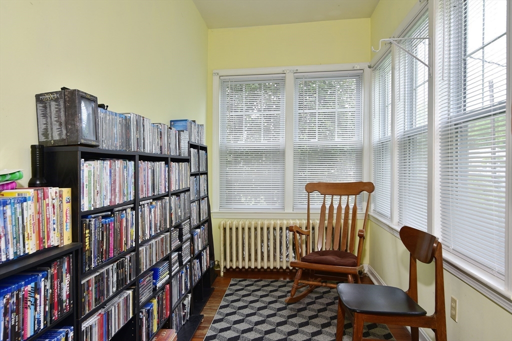482 Smith Neck Road Dartmouth, MA 02748 - Photo 36 of 40 a view of a room with furniture and book shelf
