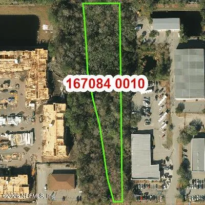 a front view of multi story residential apartment building with yard