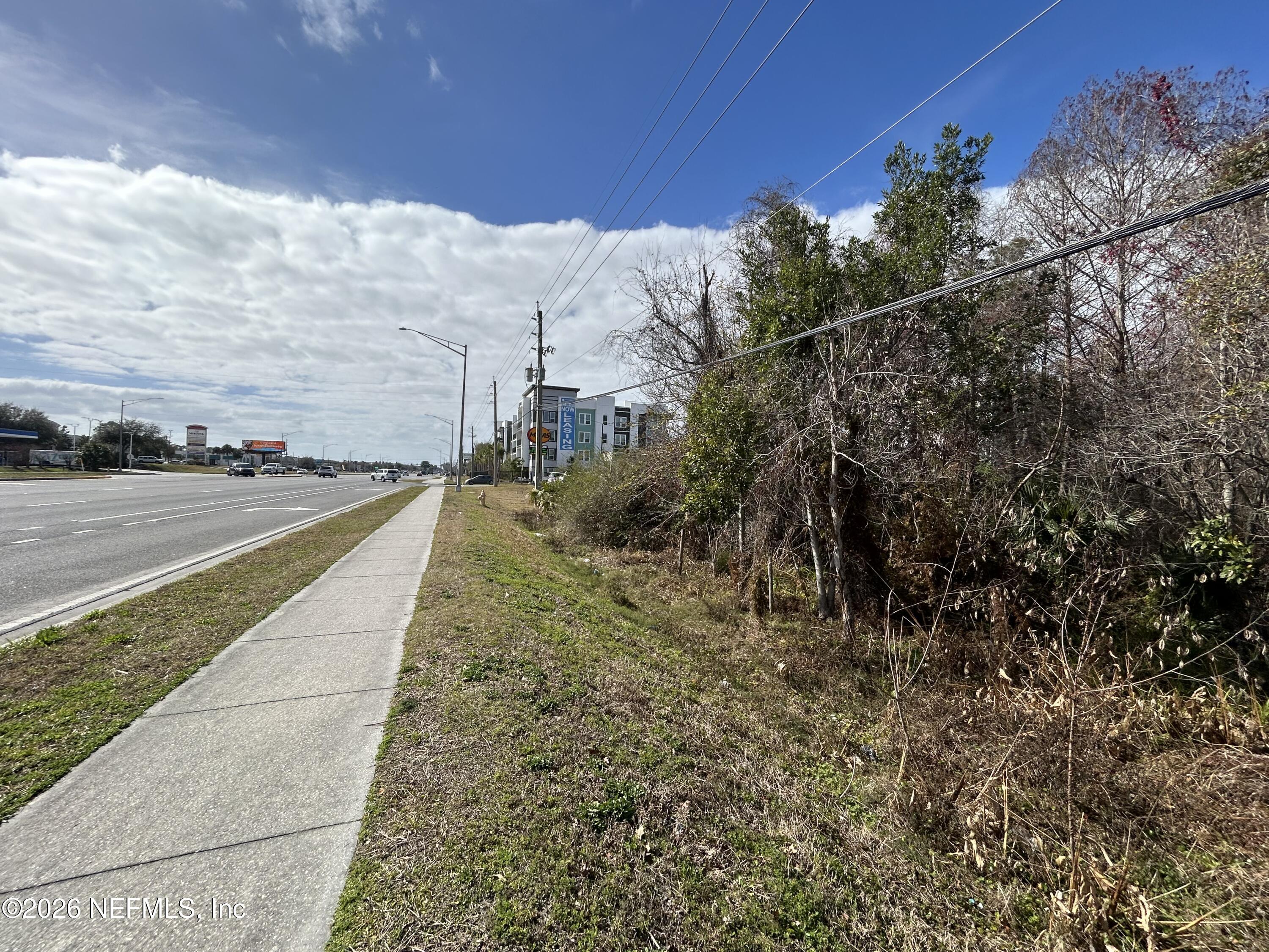 0 Beach Boulevard Jacksonville, FL 32250 - Photo 3 of 15 a view of a pathway both side of building