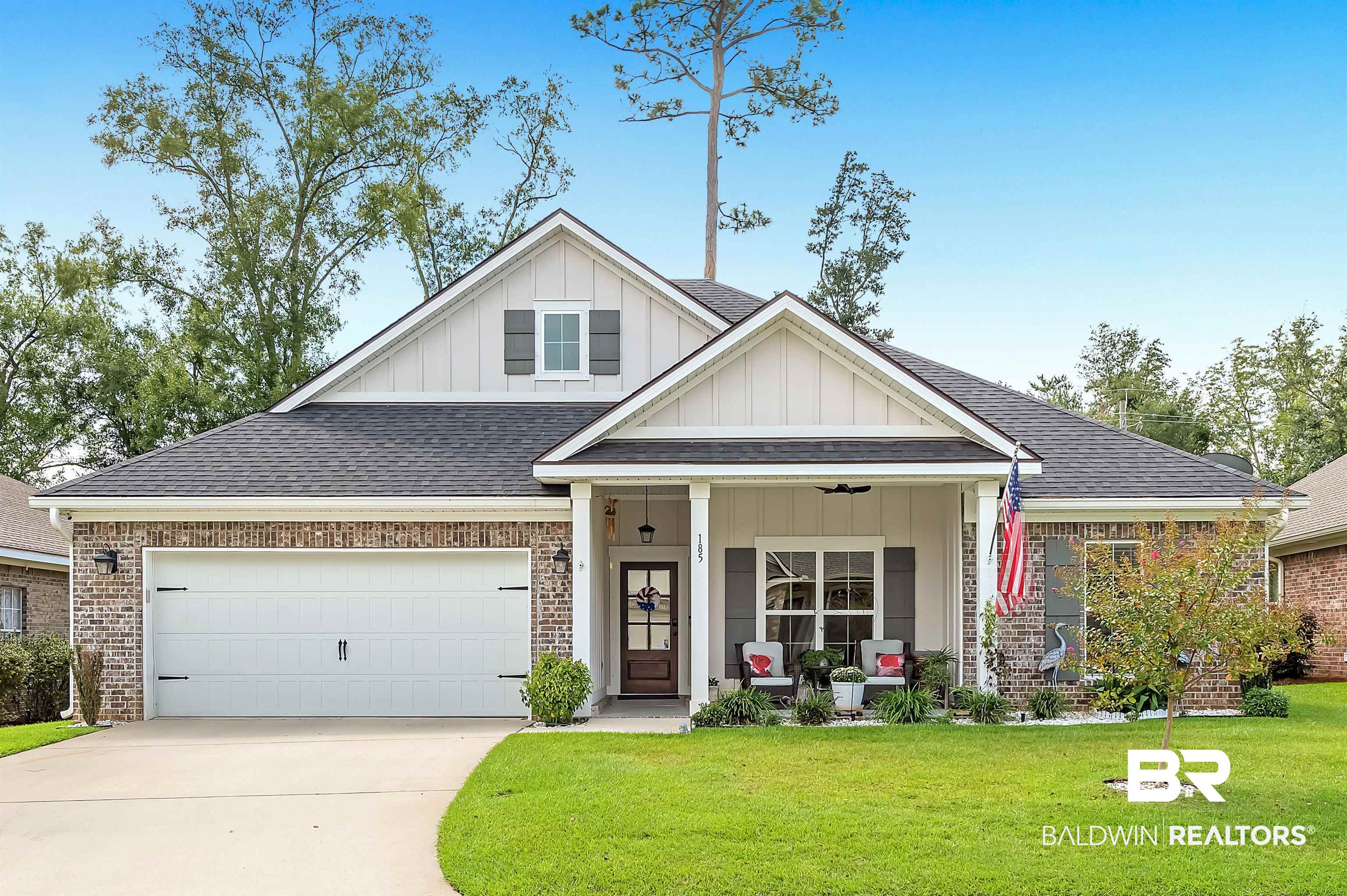 185 Mark Twain Loop Foley, AL 36535 - Photo 1 of 54 Craftsman inspired home featuring a garage, covered porch, and a front lawn