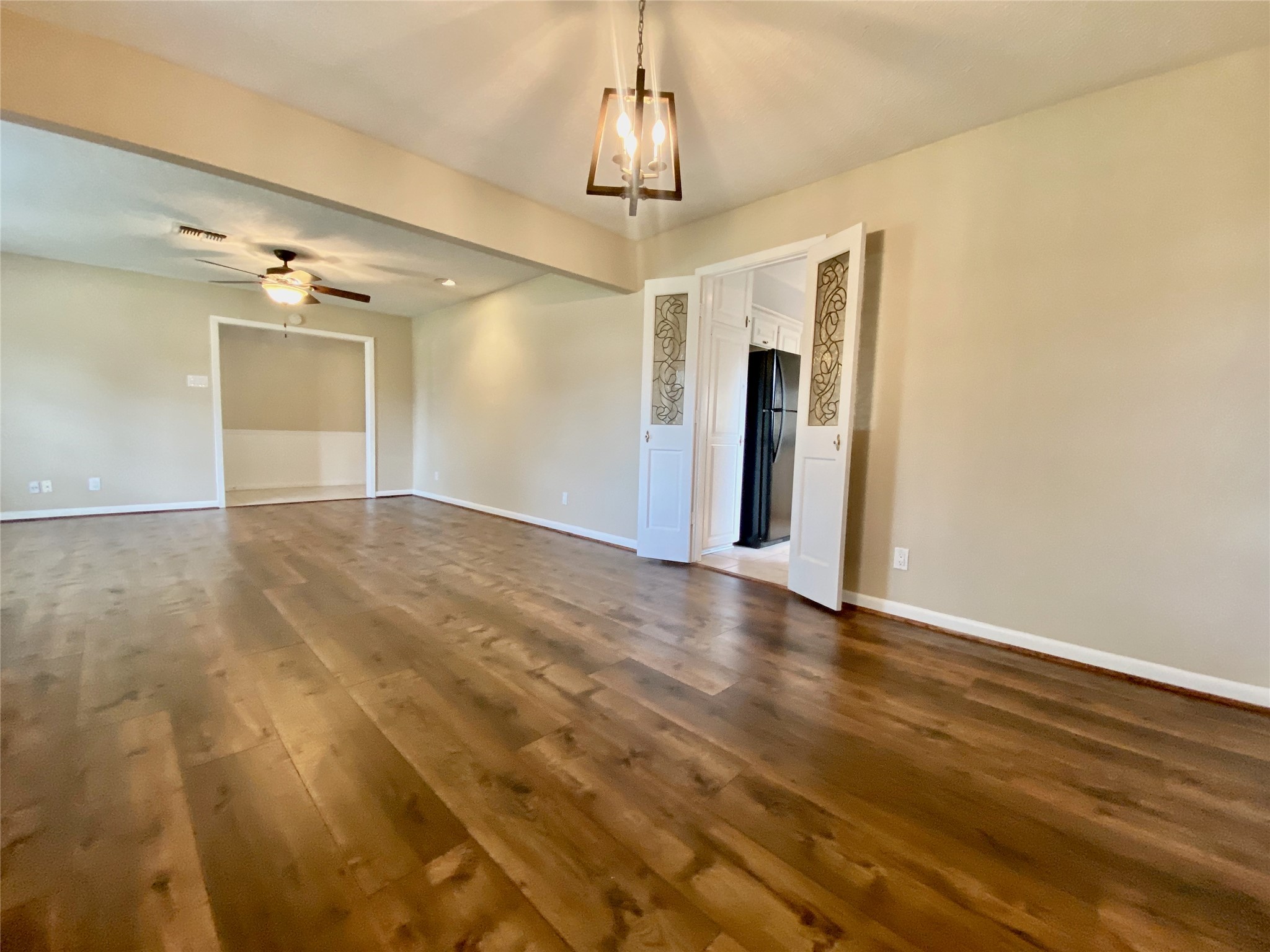 2206 Tannehill Drive Houston, TX 77008 - Photo 14 of 42 a view of a livingroom with a chandelier