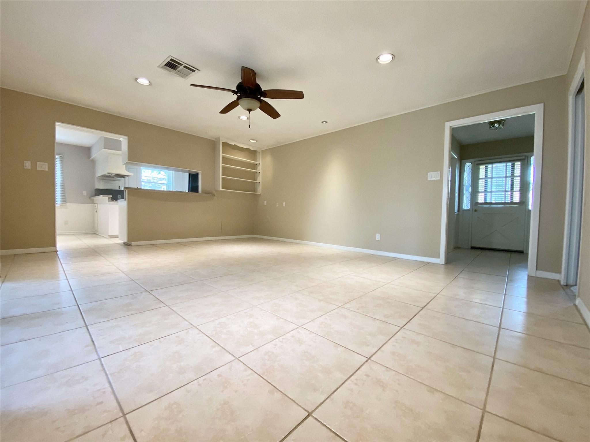 2206 Tannehill Drive Houston, TX 77008 - Photo 23 of 42 a view of a livingroom with a furniture and a ceiling fan