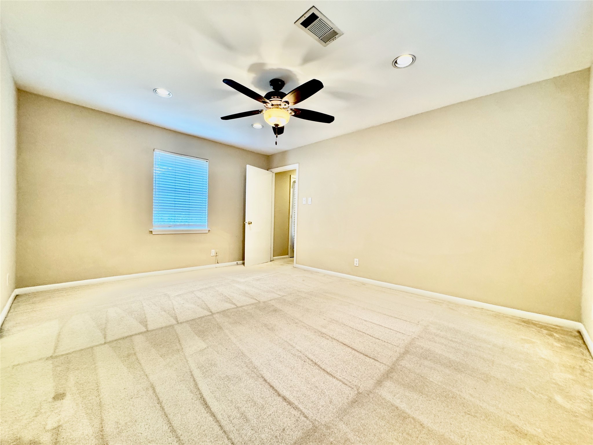 2206 Tannehill Drive Houston, TX 77008 - Photo 27 of 42 a view of an empty room with a window