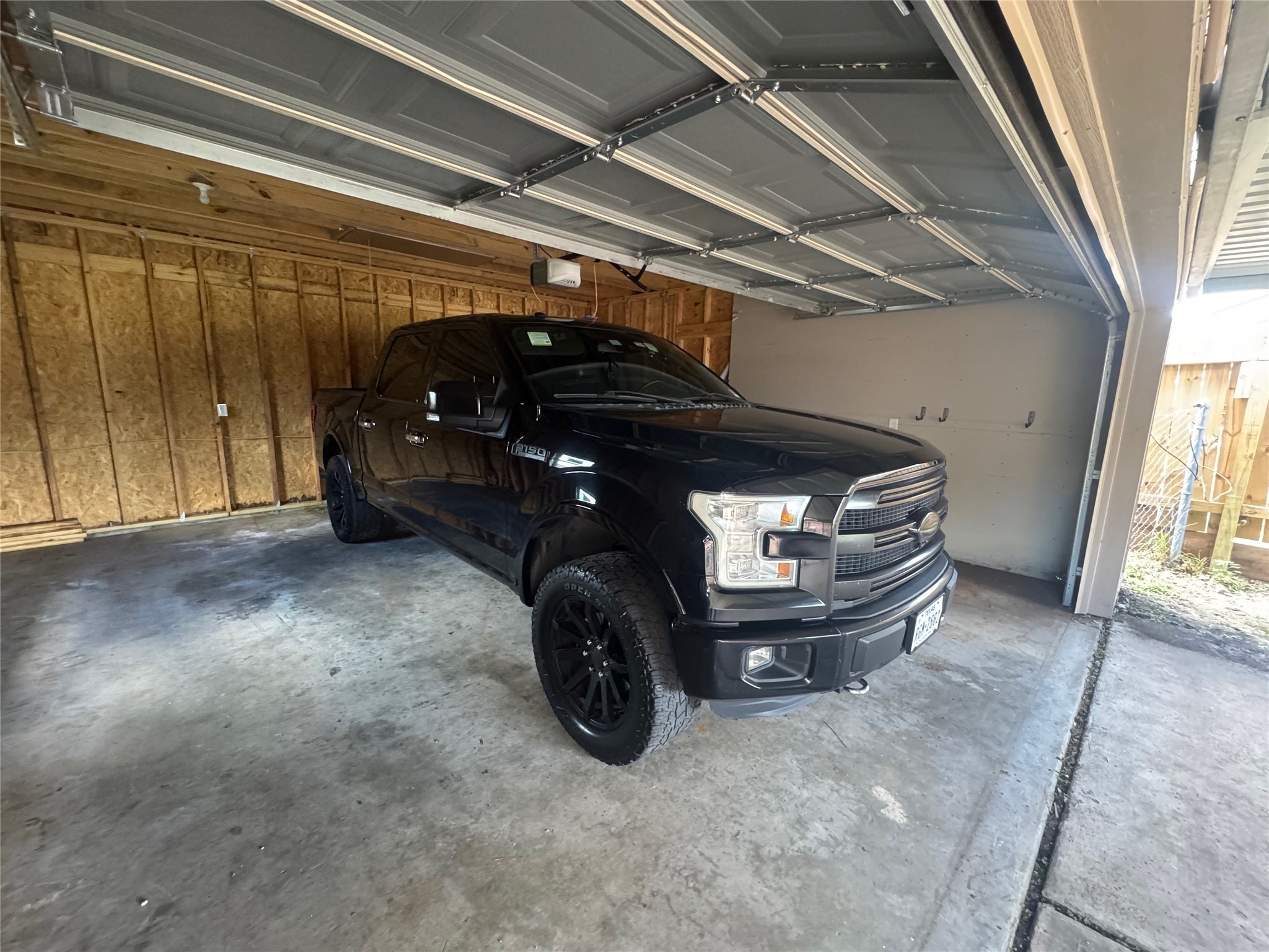 2206 Tannehill Drive Houston, TX 77008 - Photo 42 of 42 a car parked in garage