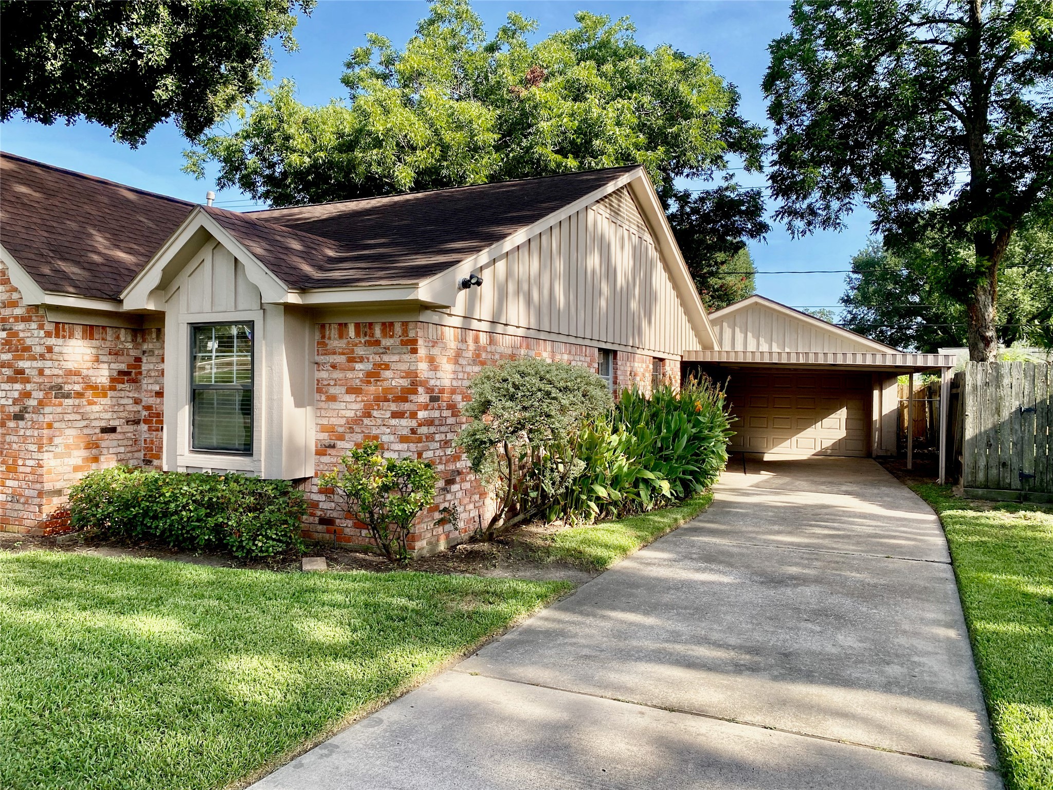 2206 Tannehill Drive Houston, TX 77008 - Photo 5 of 42 a front view of a house with a garden and plants