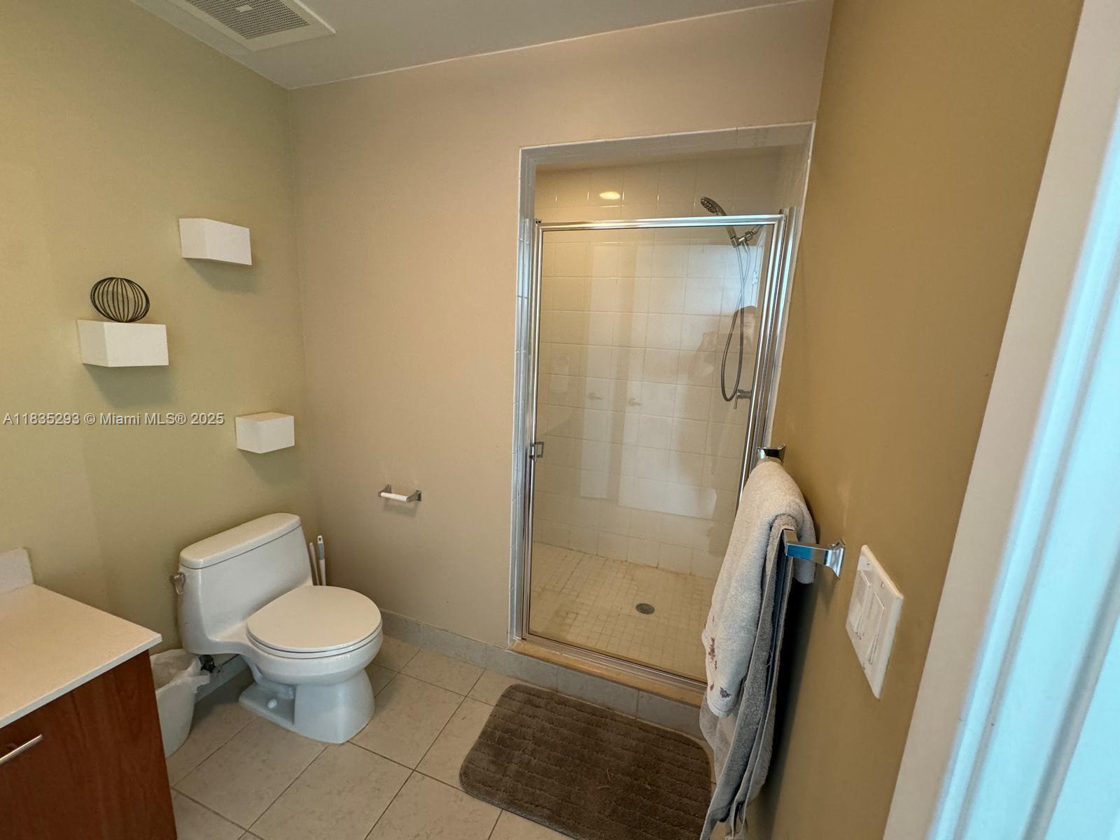 3301 Northeast 1st Avenue, Unit H2903 Miami, FL 33137 - Photo 13 of 20 a bathroom with a toilet and a shower