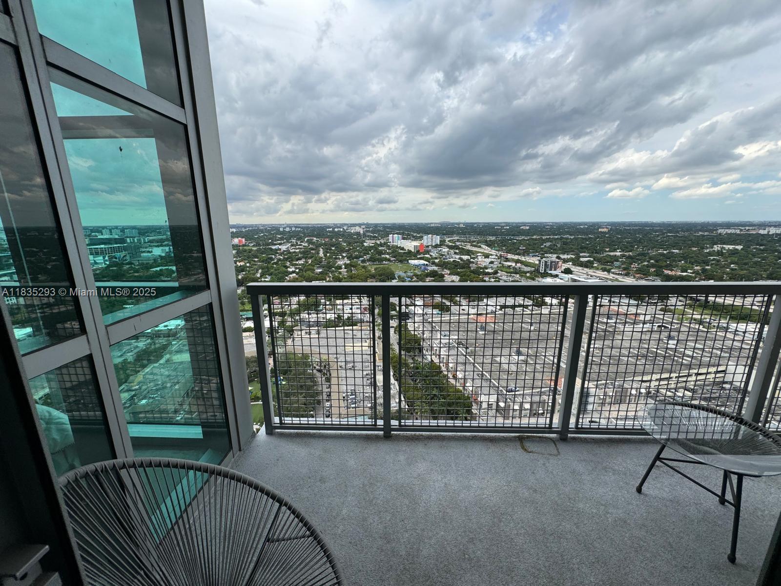 3301 Northeast 1st Avenue, Unit H2903 Miami, FL 33137 - Photo 16 of 20 a view of balcony with furniture