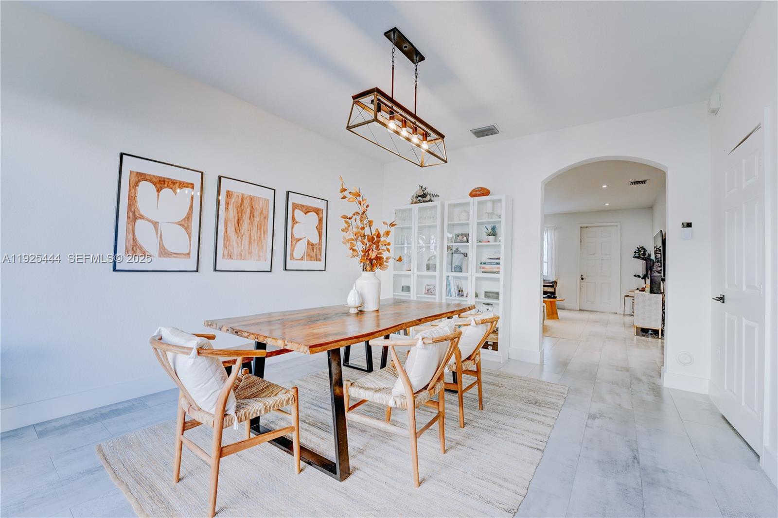 12771 Southwest 133rd Street Miami, FL 33186 - Photo 12 of 39 a dining room with furniture and window
