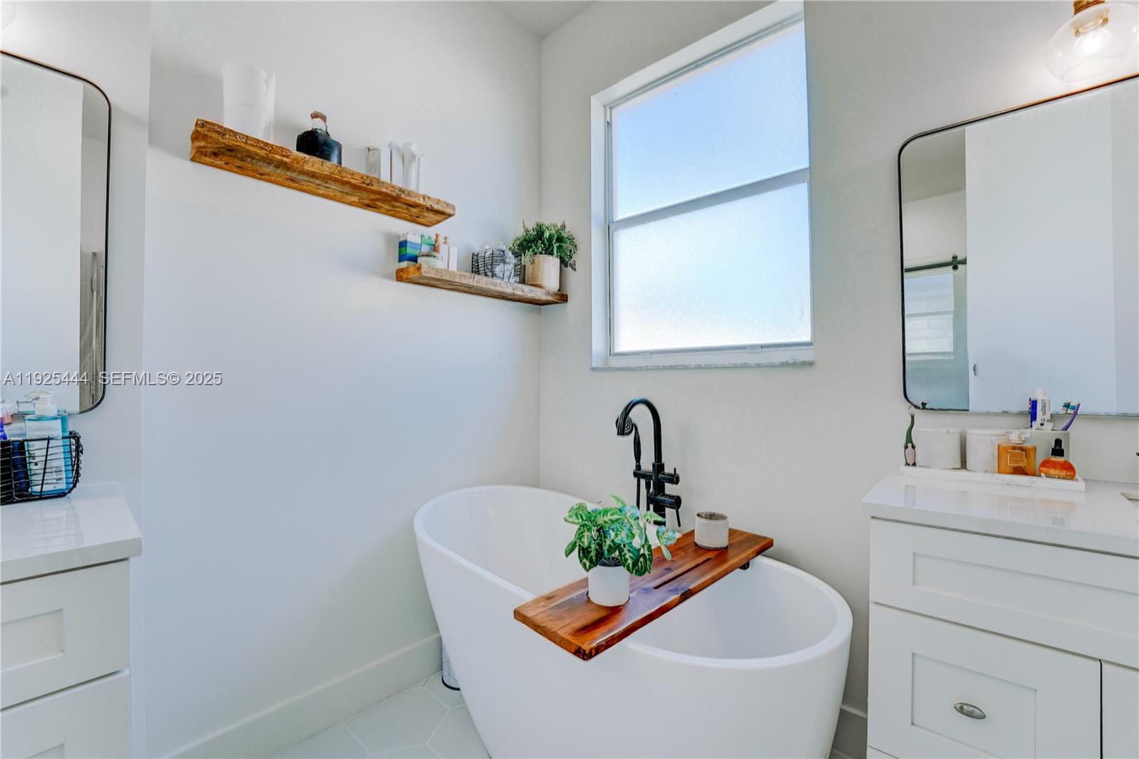 12771 Southwest 133rd Street Miami, FL 33186 - Photo 25 of 39 a living room with furniture and a sink