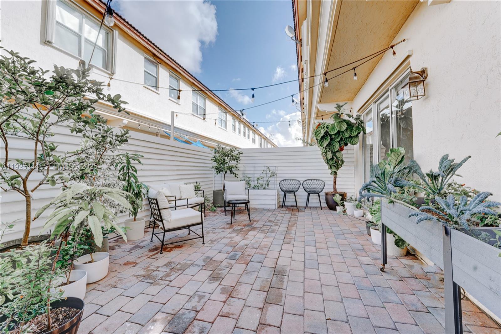 12771 Southwest 133rd Street Miami, FL 33186 - Photo 35 of 39 a view of outdoor space with seating area