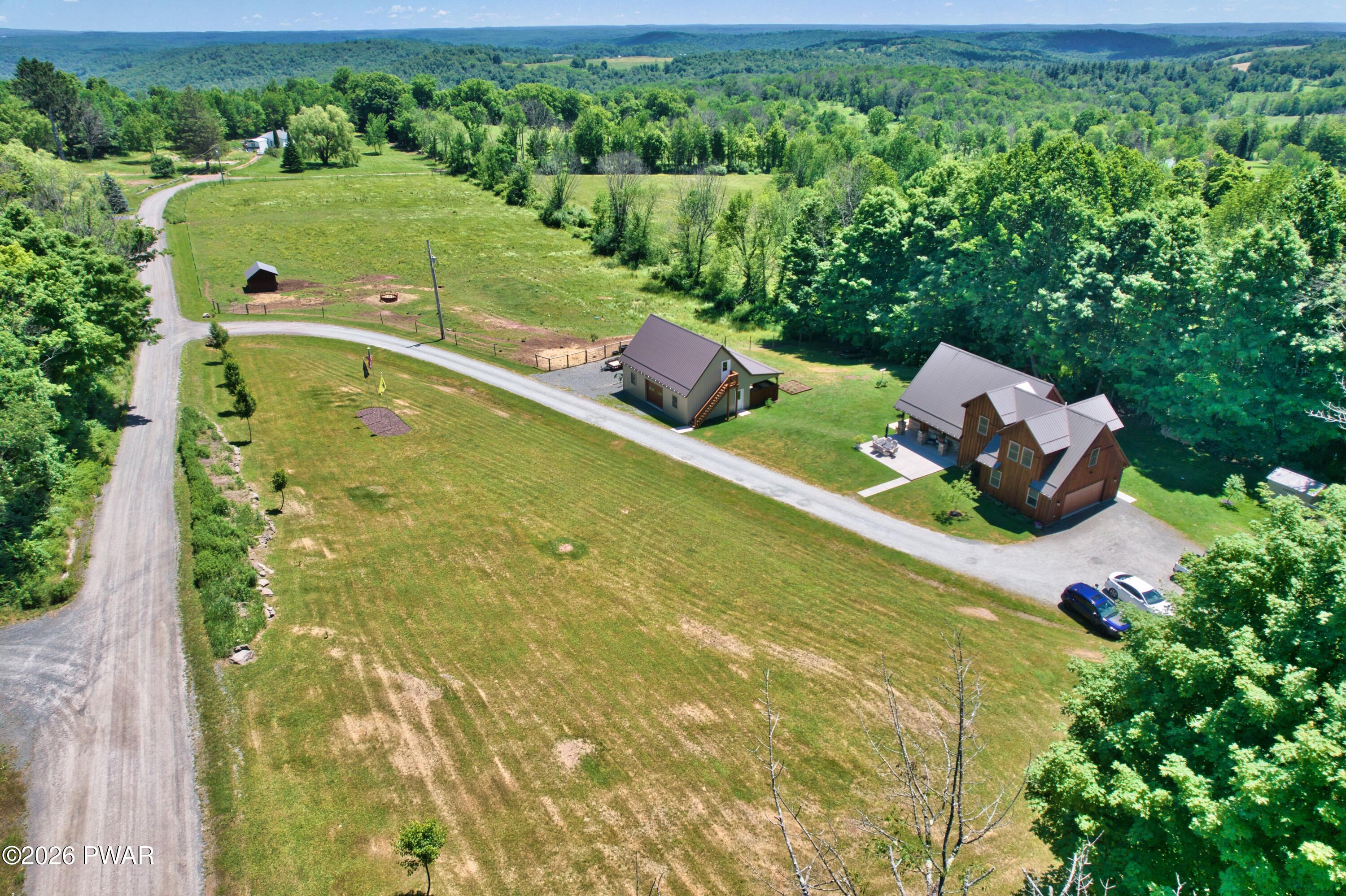 149 Sheards Road Milanville, PA 18443 - Photo 47 of 57 a view of a swimming pool and outdoor space