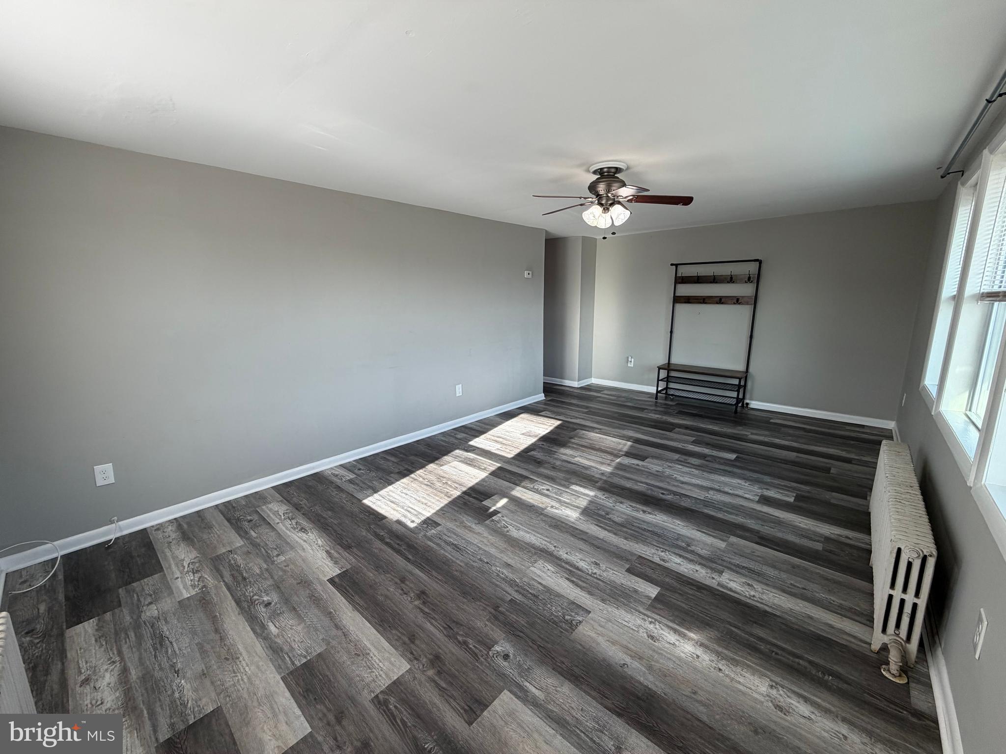 69 Berlin Road, Unit B Clementon, NJ 08021 - Photo 16 of 18 a view of empty room with ceiling fan