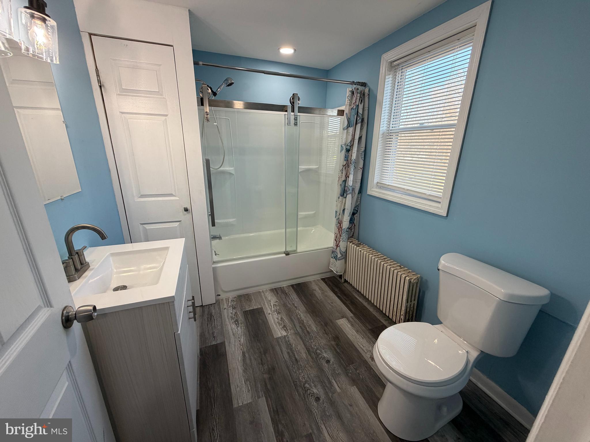 69 Berlin Road, Unit B Clementon, NJ 08021 - Photo 6 of 18 a bathroom with a toilet and a shower