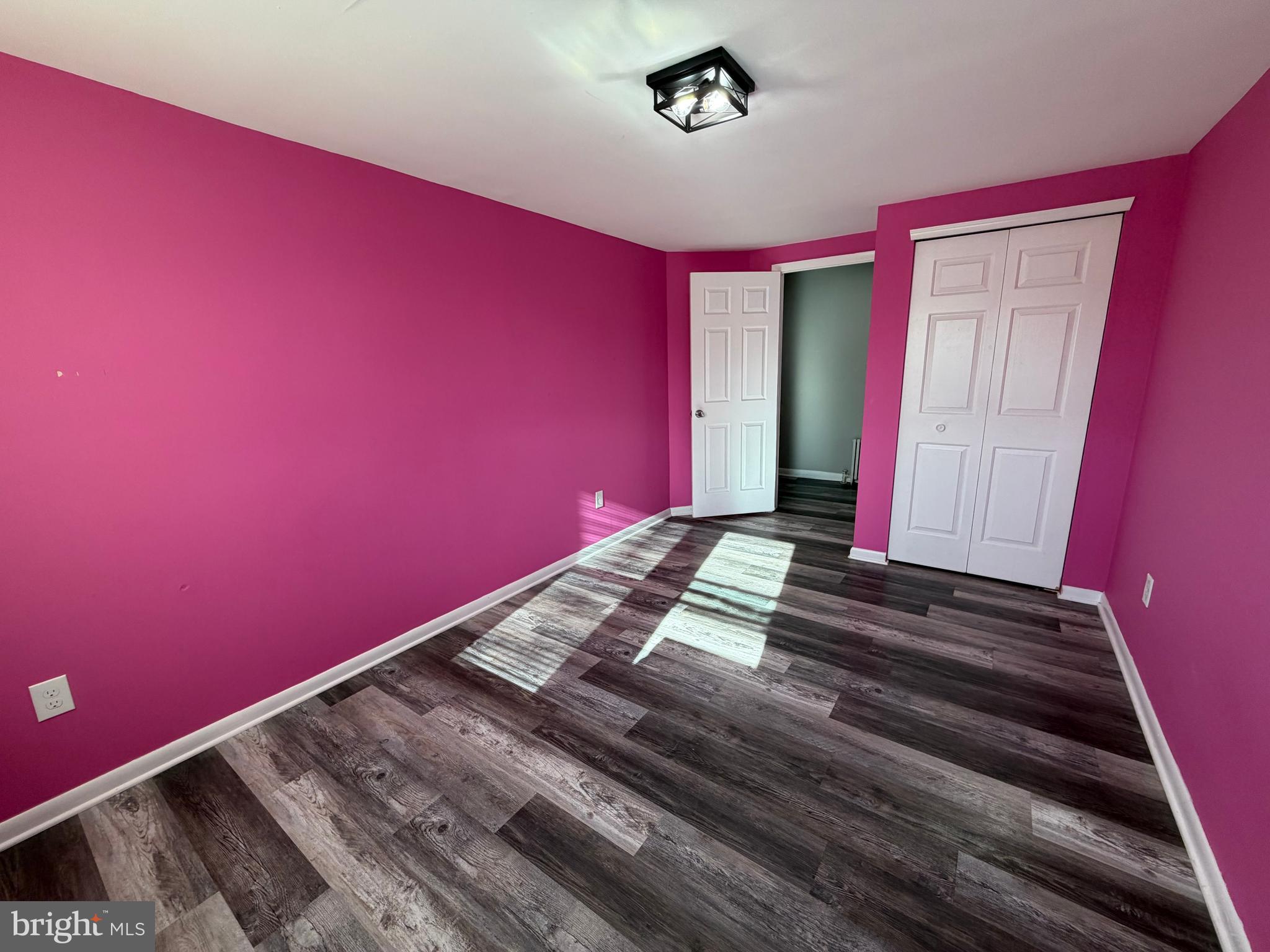 69 Berlin Road, Unit B Clementon, NJ 08021 - Photo 10 of 18 a view of a room with wooden floor and stairs