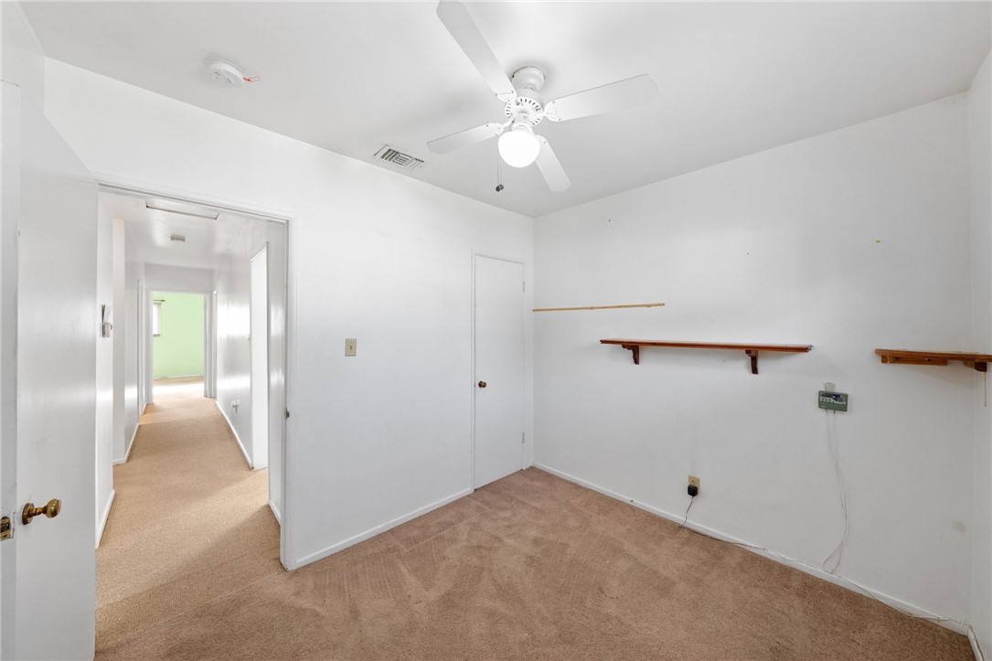 3075 David Street Riverside, CA 92506 - Photo 16 of 40 Alternate view highlighting the room’s flexible layout and storage options, with direct access to the hallway.