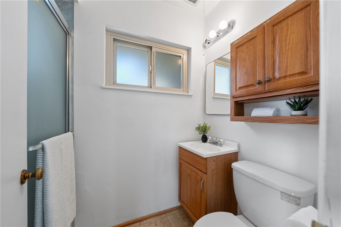 3075 David Street Riverside, CA 92506 - Photo 24 of 40 Additional view highlighting the vanity storage and frosted window for soft natural light.