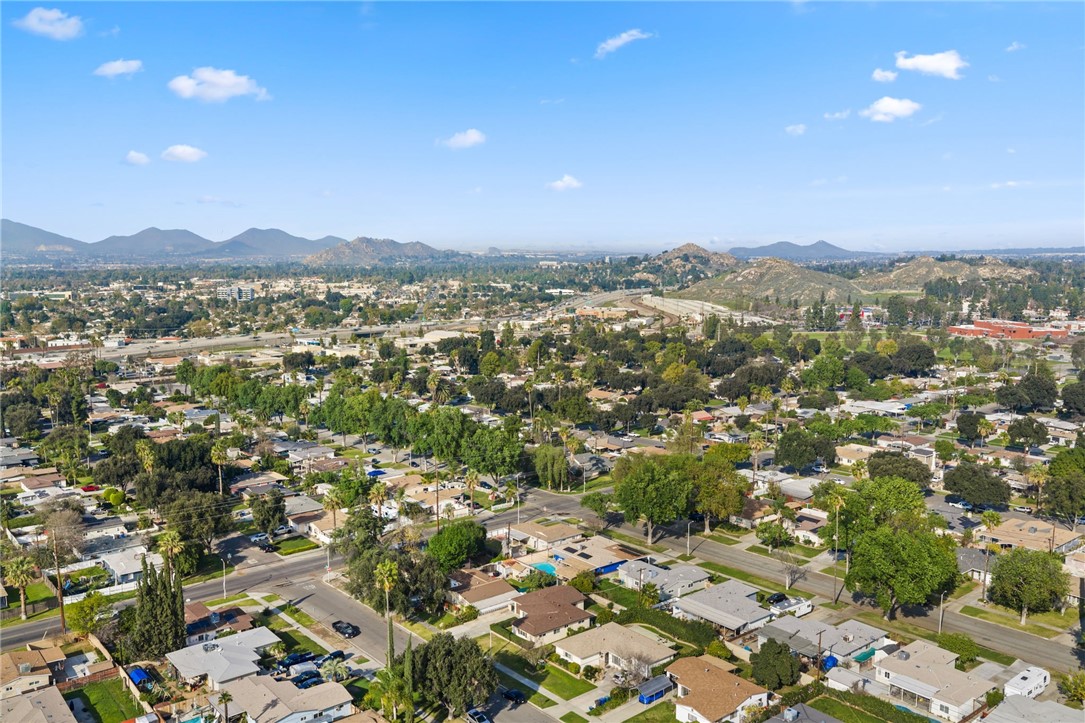 3075 David Street Riverside, CA 92506 - Photo 34 of 40 Wide aerial view of the surrounding area with scenic mountain backdrop.
