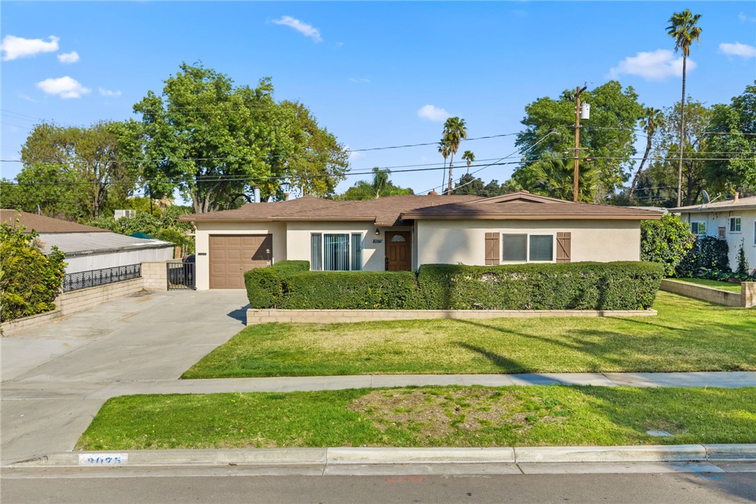 3075 David Street Riverside, CA 92506 - Photo 37 of 40 Clean, centered façade with low-maintenance landscaping and welcoming entry.
