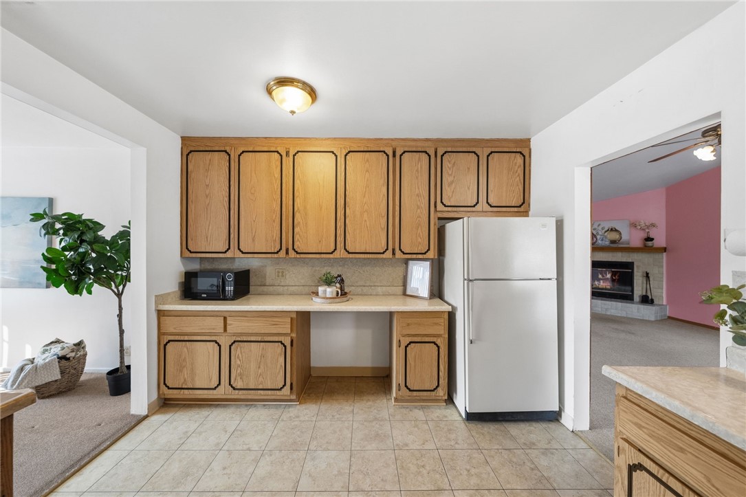 3075 David Street Riverside, CA 92506 - Photo 10 of 40 Wide, open layout with ample storage and a dedicated counter nook, offering an easy flow into the main living spaces.