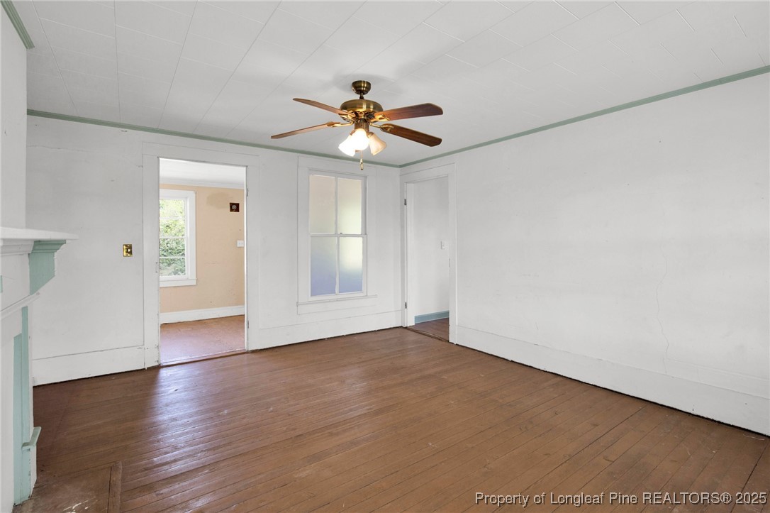 5125 Maxwell Road Autryville, NC 28318 - Photo 17 of 37 wooden floor in an empty room with a window