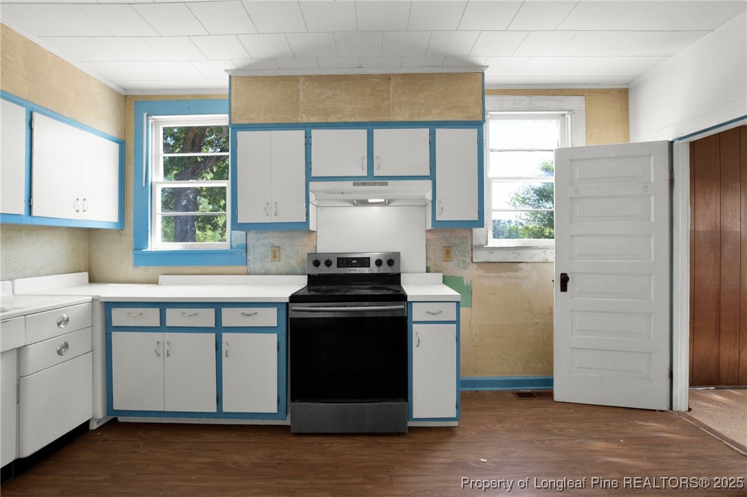 5125 Maxwell Road Autryville, NC 28318 - Photo 24 of 37 a kitchen with a stove and a window