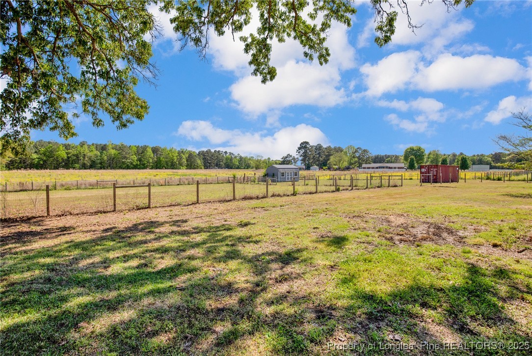 5125 Maxwell Road Autryville, NC 28318 - Photo 37 of 37 a view of an outdoor space and a yard