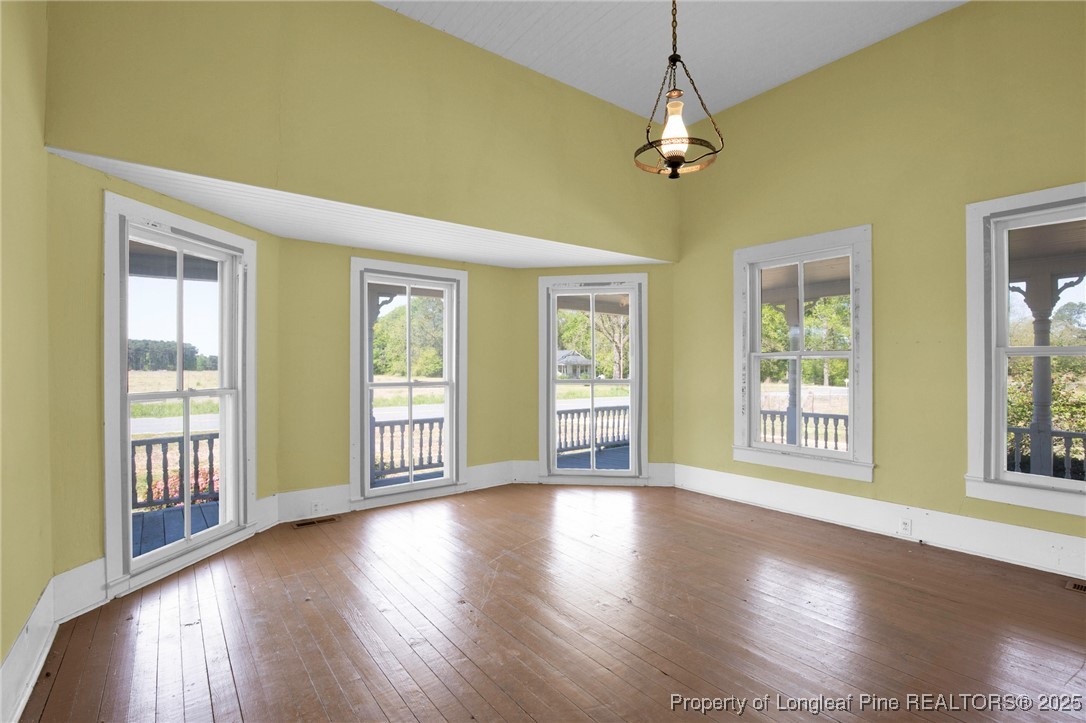 5125 Maxwell Road Autryville, NC 28318 - Photo 7 of 37 a view of a room with wooden floor and balcony