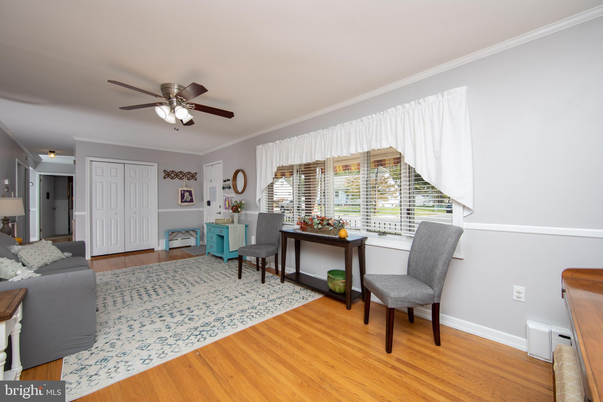 333 Ridge Avenue Glendora, NJ 08029 - Photo 5 of 47 Living Room with Ceiling Fan & Bay Window