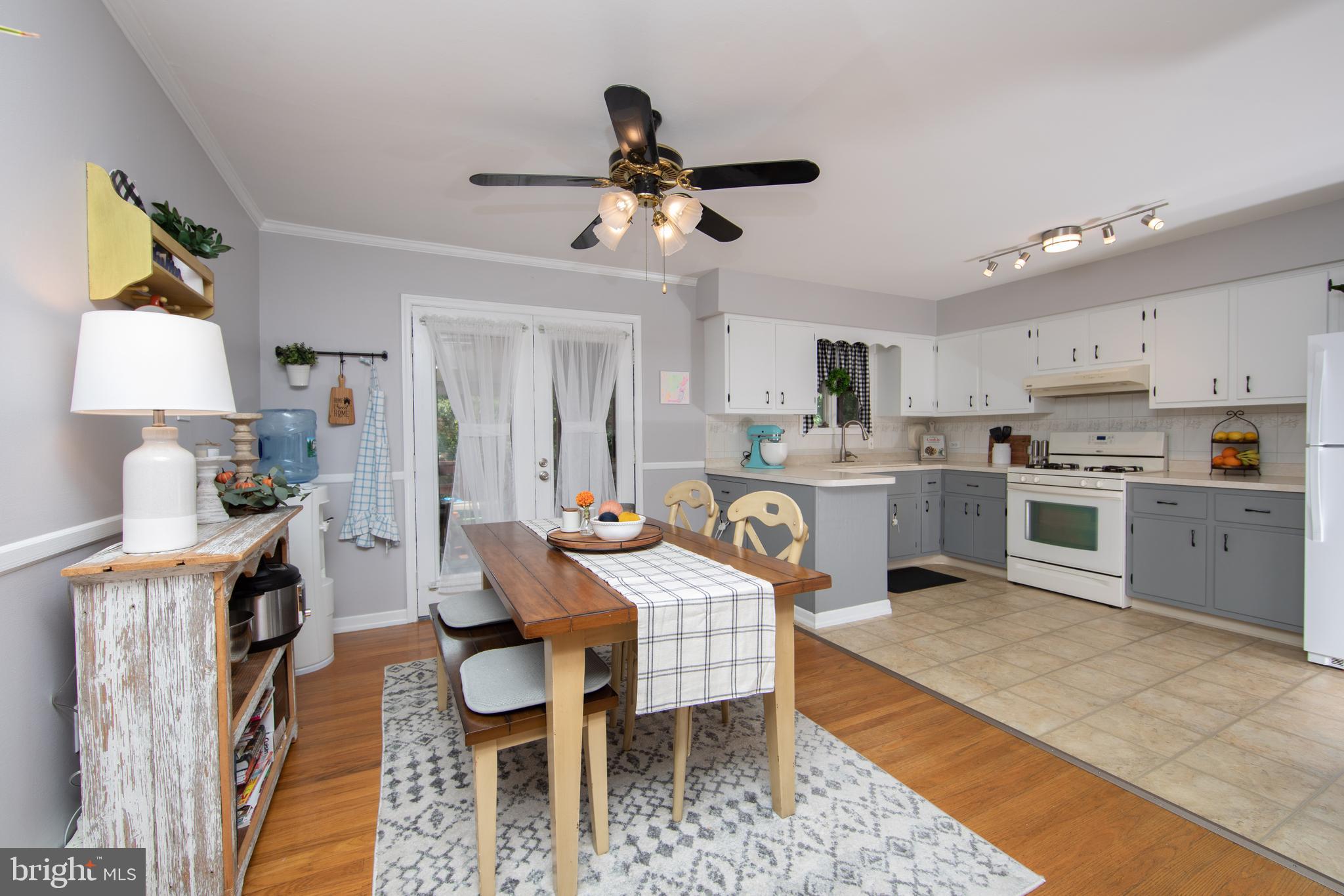 333 Ridge Avenue Glendora, NJ 08029 - Photo 7 of 47 Dining Area with French Doors to Screened In Deck