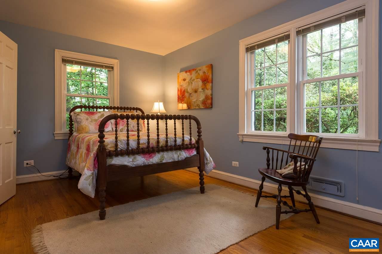 114 Buckingham Road Charlottesville, VA 22903 - Photo 8 of 17 a bedroom with furniture and windows