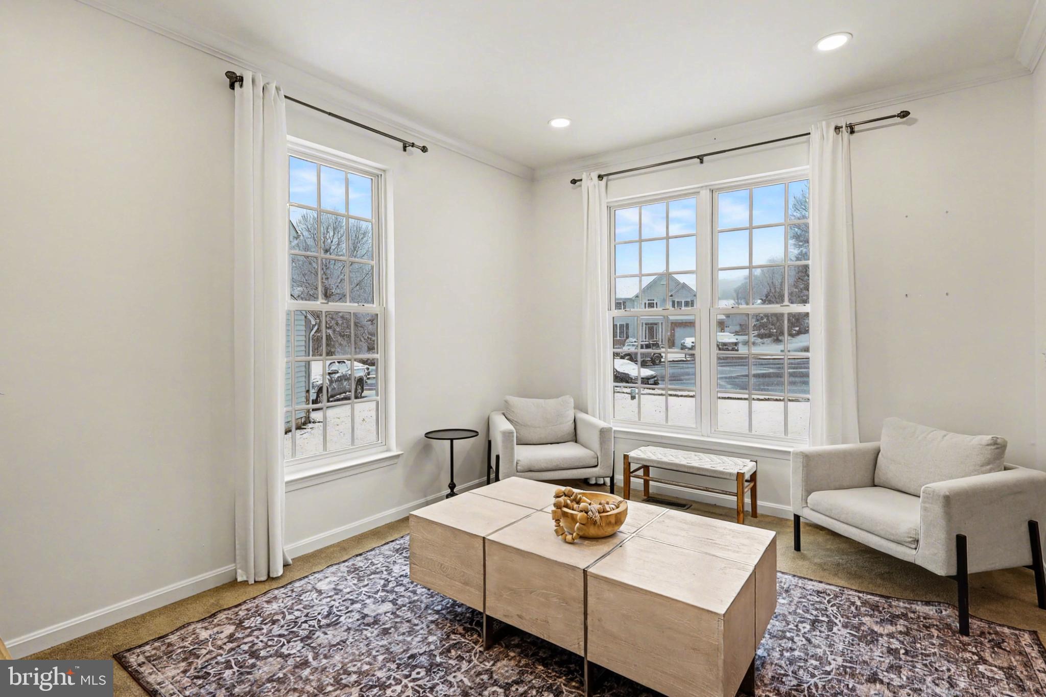 19201 Buna Street Triangle, VA 22172 - Photo 14 of 69 Bright and airy living space with large windows.