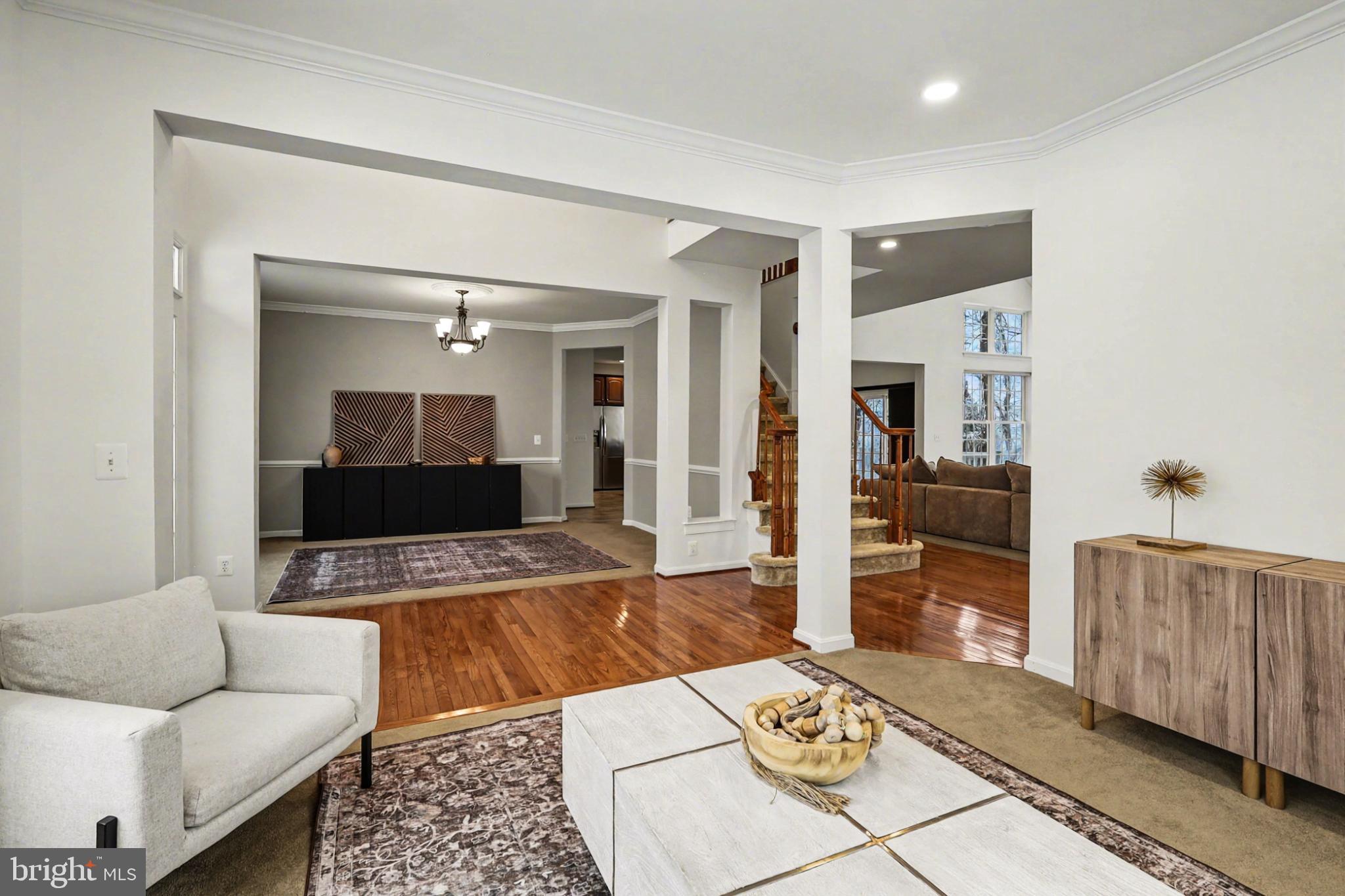 19201 Buna Street Triangle, VA 22172 - Photo 15 of 69 Spacious living area with elegant design.