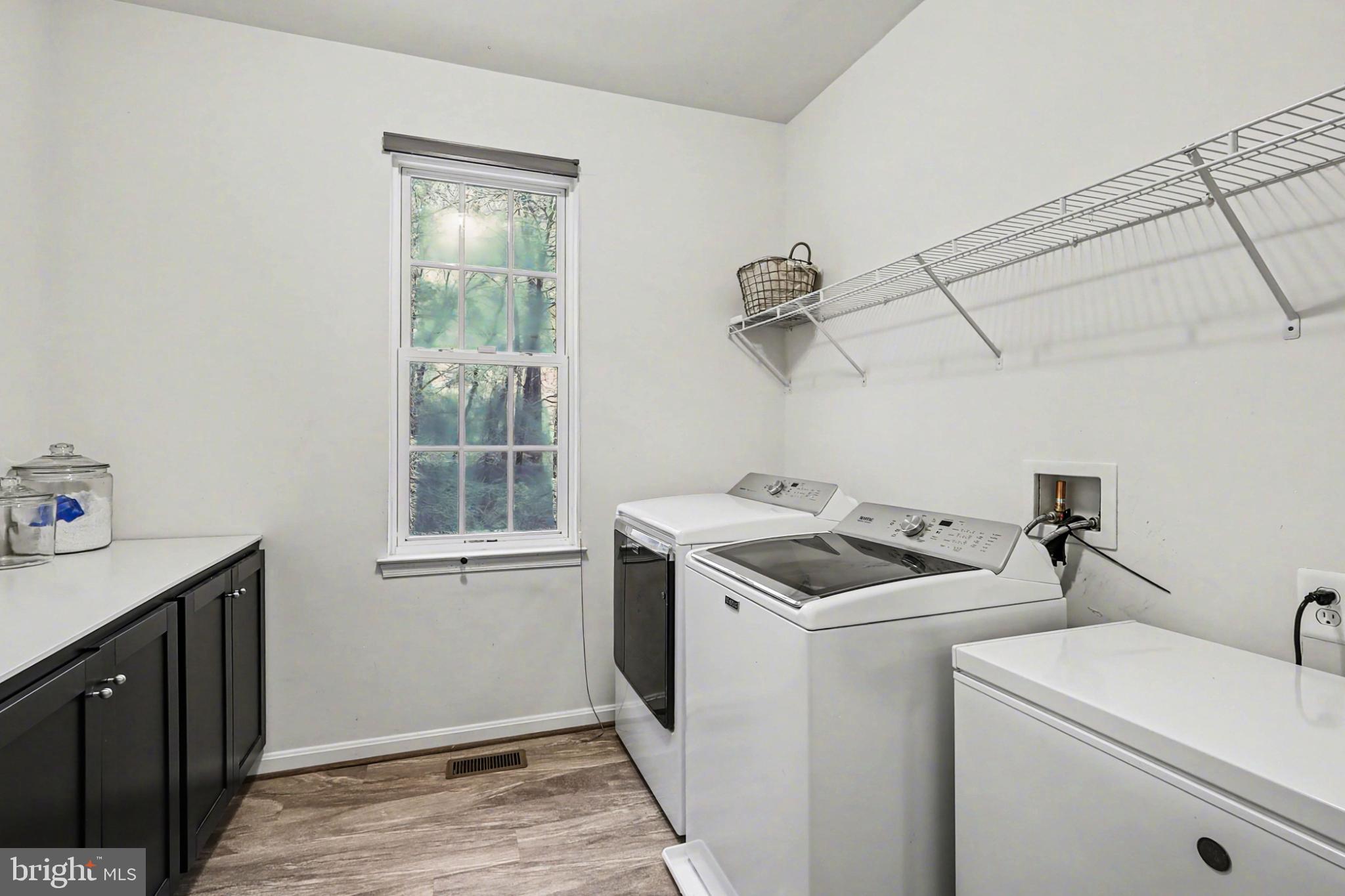 19201 Buna Street Triangle, VA 22172 - Photo 29 of 69 Bright and functional laundry space.