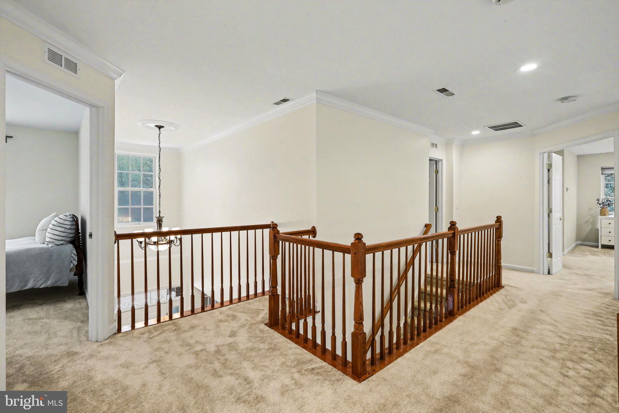 19201 Buna Street Triangle, VA 22172 - Photo 31 of 69 Spacious landing with elegant wood accents.