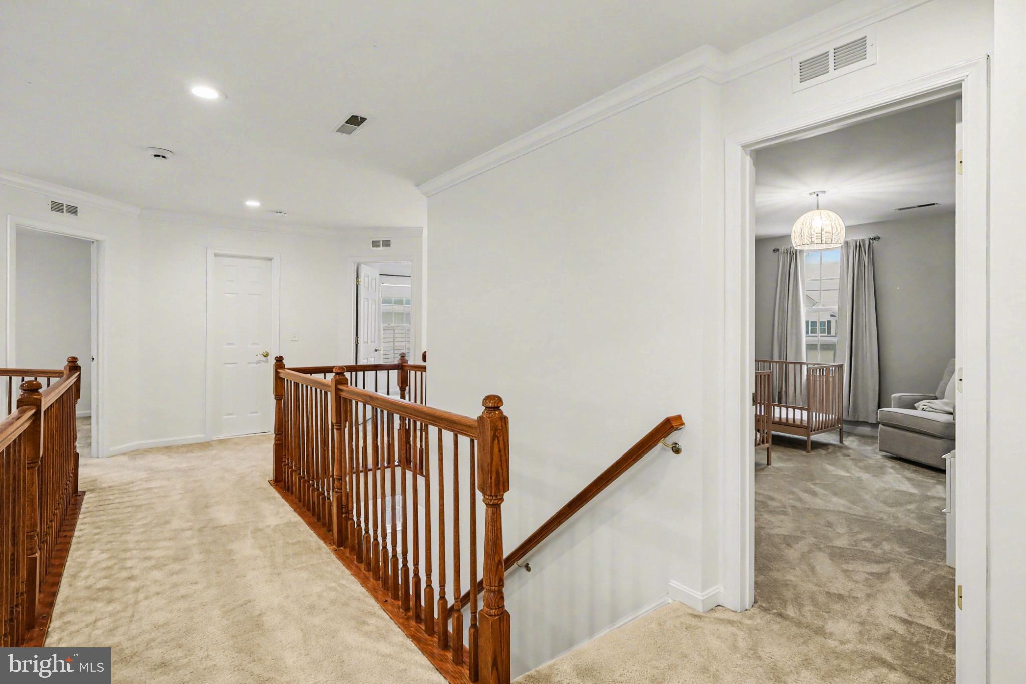 19201 Buna Street Triangle, VA 22172 - Photo 33 of 69 Bright and inviting upper hallway retreat.