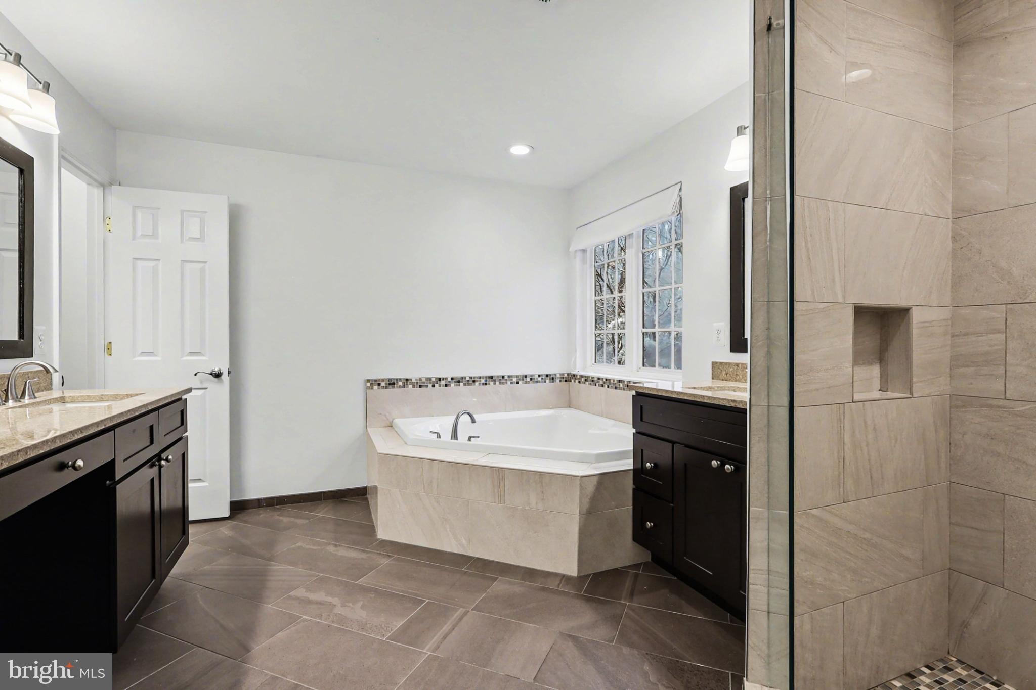 19201 Buna Street Triangle, VA 22172 - Photo 38 of 69 Elegant bathroom with modern finishes.