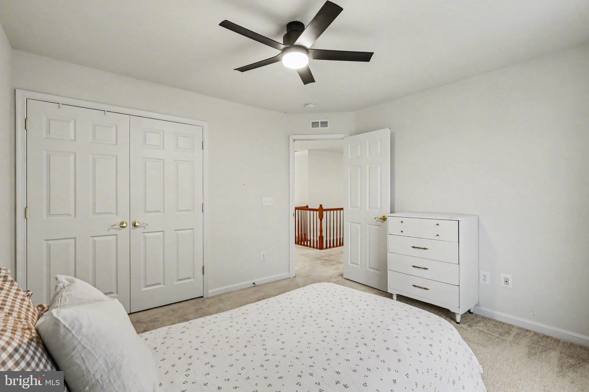19201 Buna Street Triangle, VA 22172 - Photo 43 of 69 Bright and airy bedroom with modern touches.