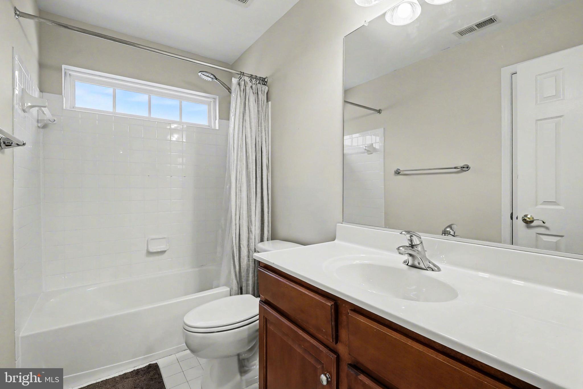 19201 Buna Street Triangle, VA 22172 - Photo 47 of 69 Bright and airy bathroom with modern finishes.