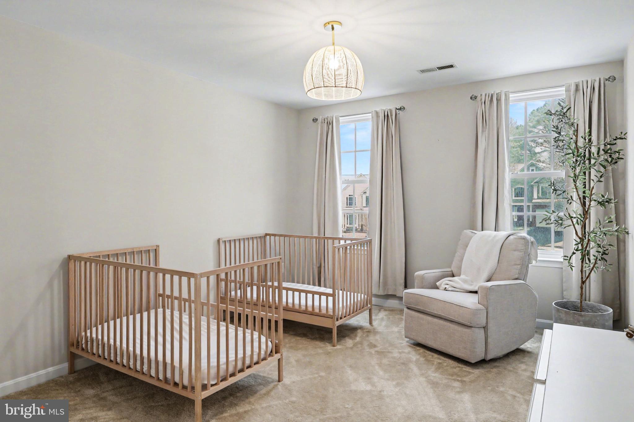 19201 Buna Street Triangle, VA 22172 - Photo 48 of 69 Serene nursery with natural light and charm.