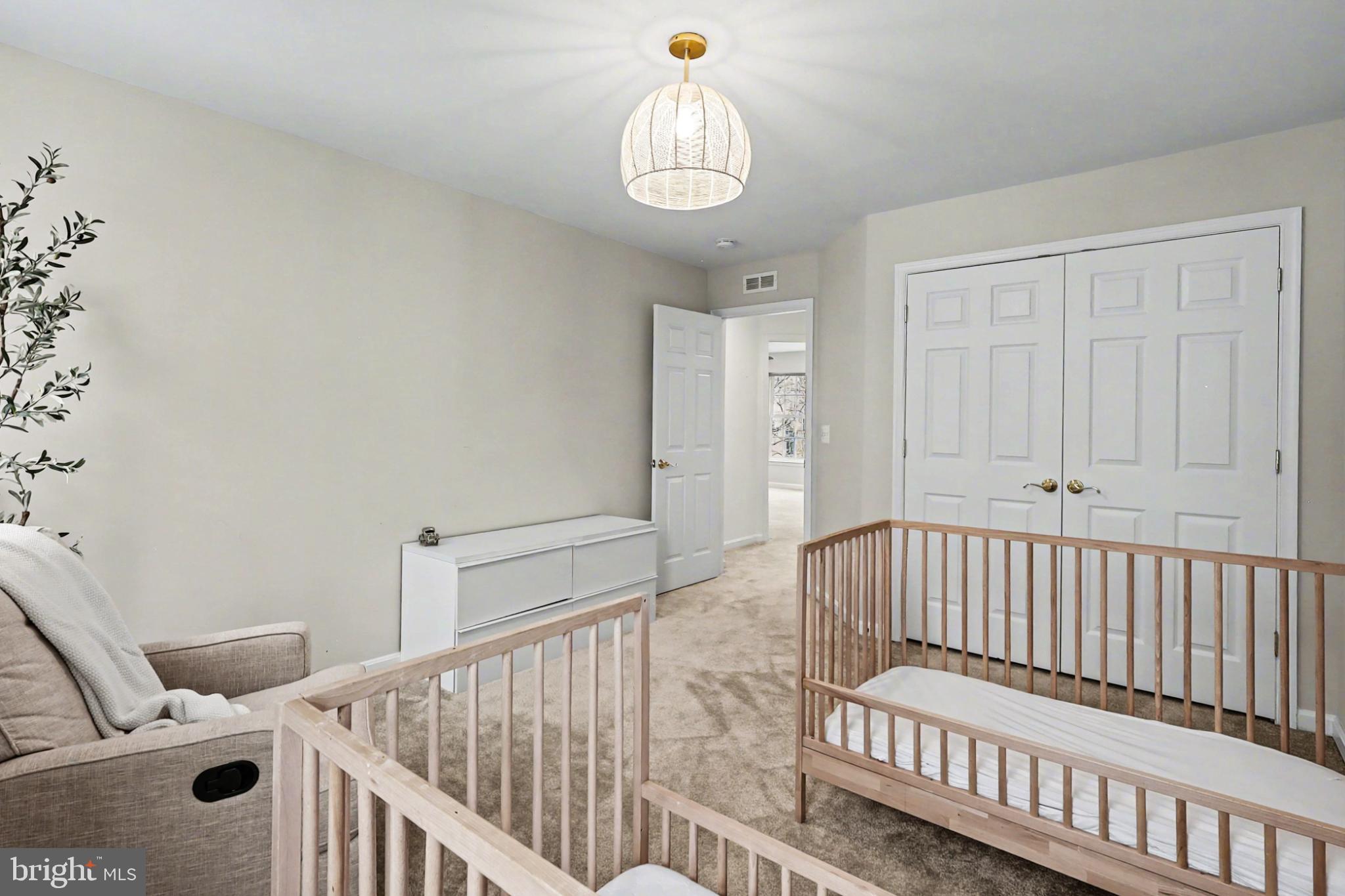 19201 Buna Street Triangle, VA 22172 - Photo 49 of 69 Serene nursery with cozy, inviting ambiance.