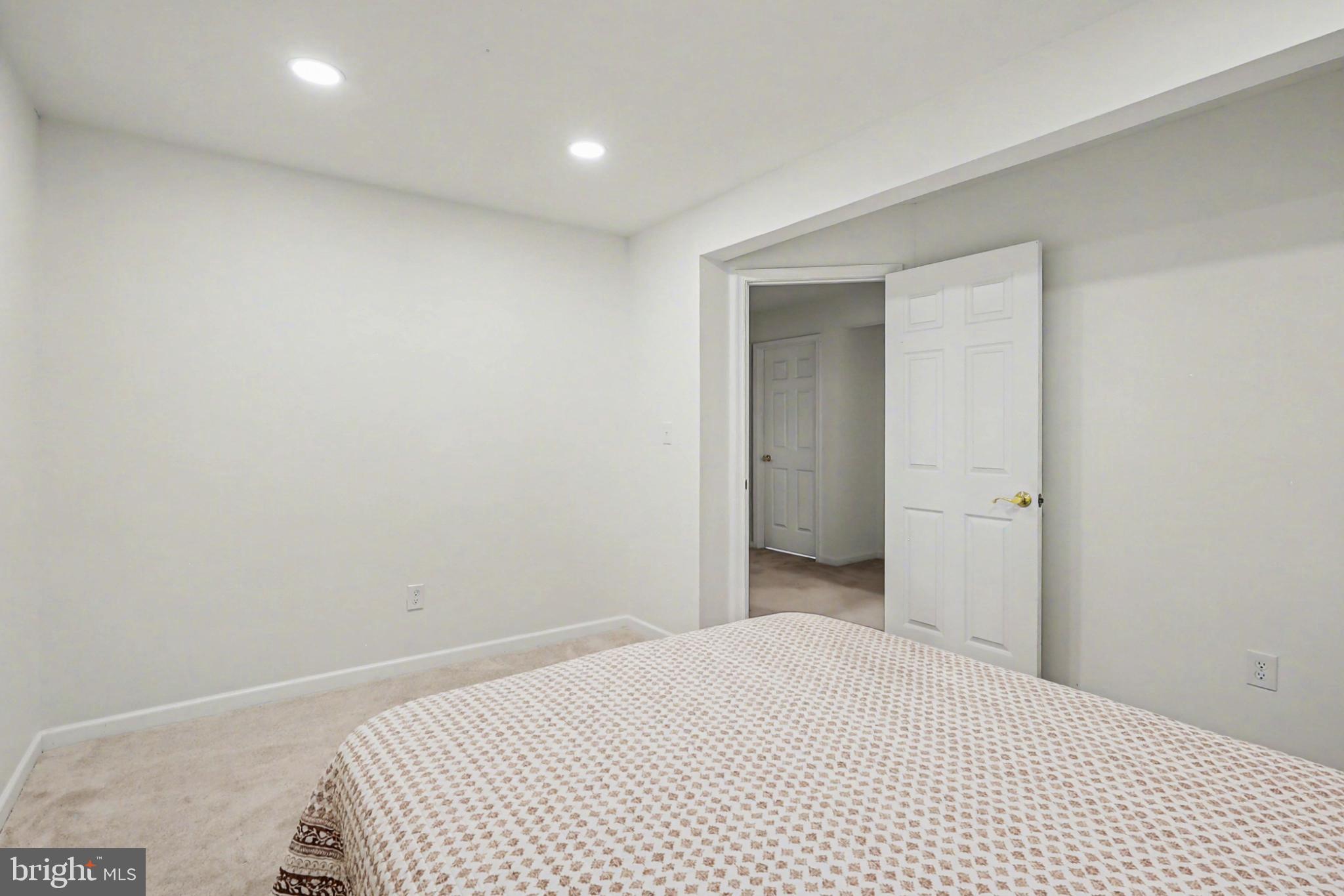 19201 Buna Street Triangle, VA 22172 - Photo 52 of 69 Bright and airy bedroom with modern design.