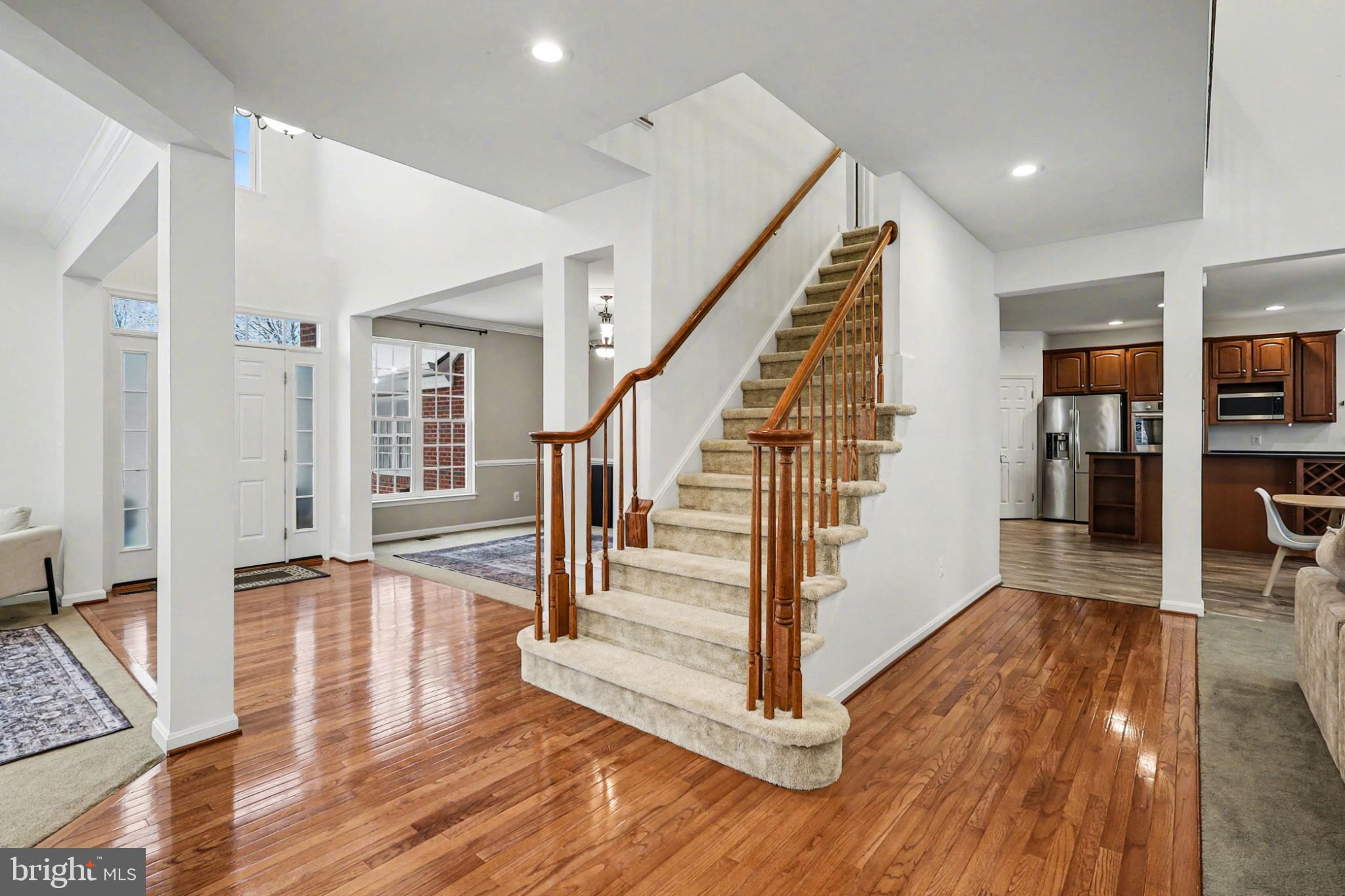19201 Buna Street Triangle, VA 22172 - Photo 9 of 69 Inviting foyer with elegant staircase.