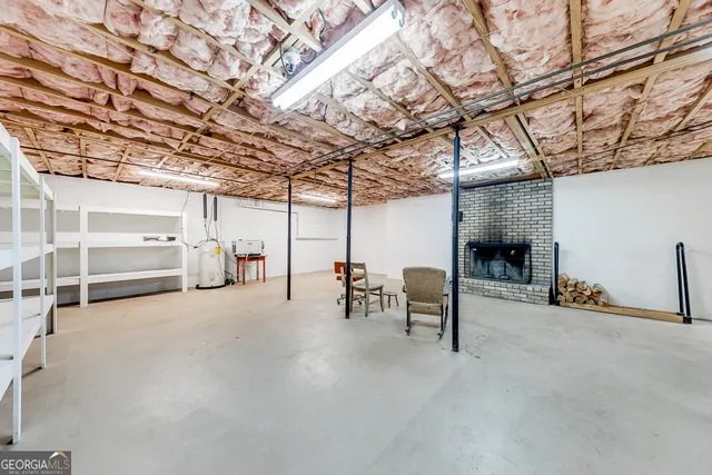 a view of a street with chairs