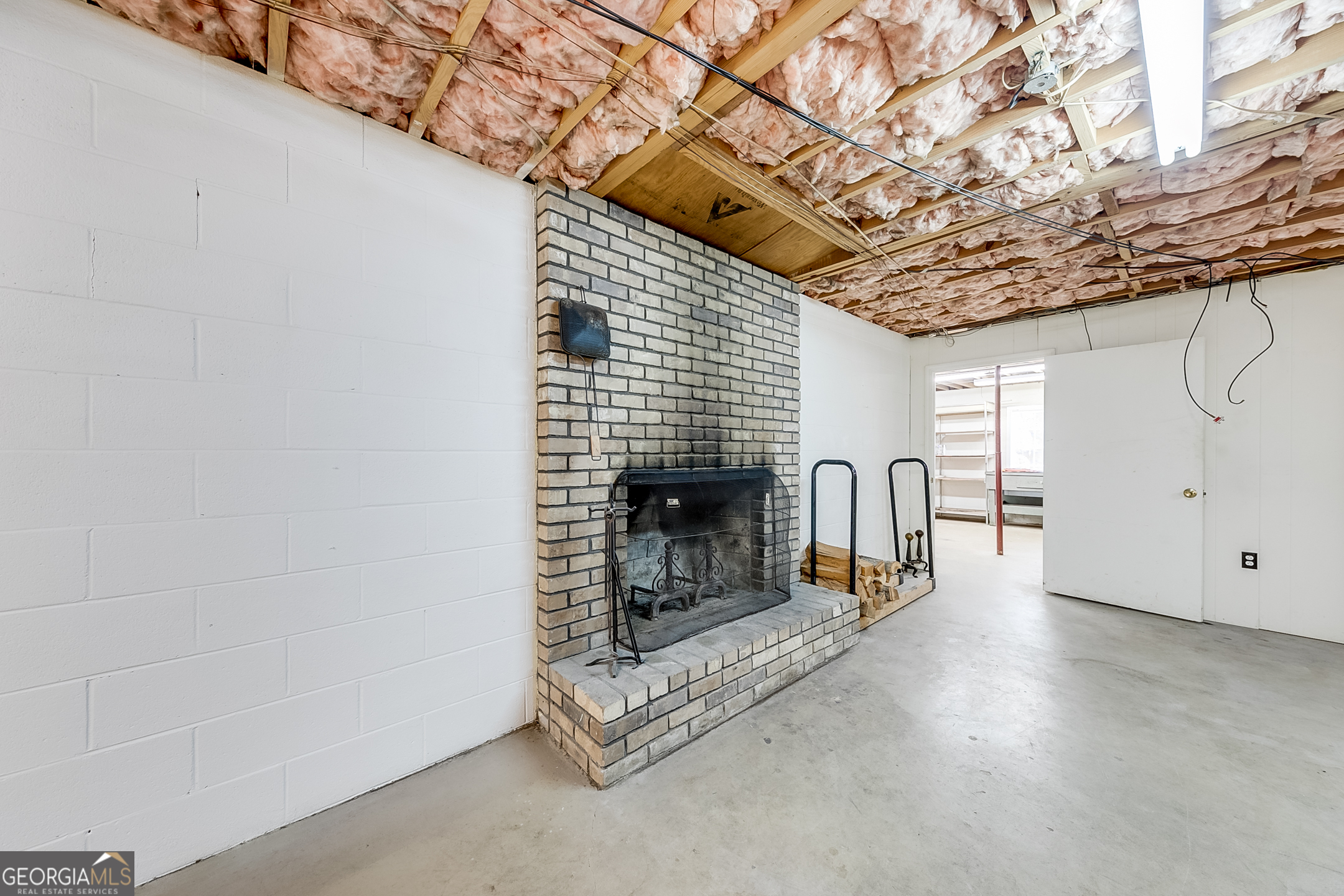 1174 Hospital Road Commerce, GA 30529 - Photo 27 of 40 a view of a livingroom with a fireplace and window