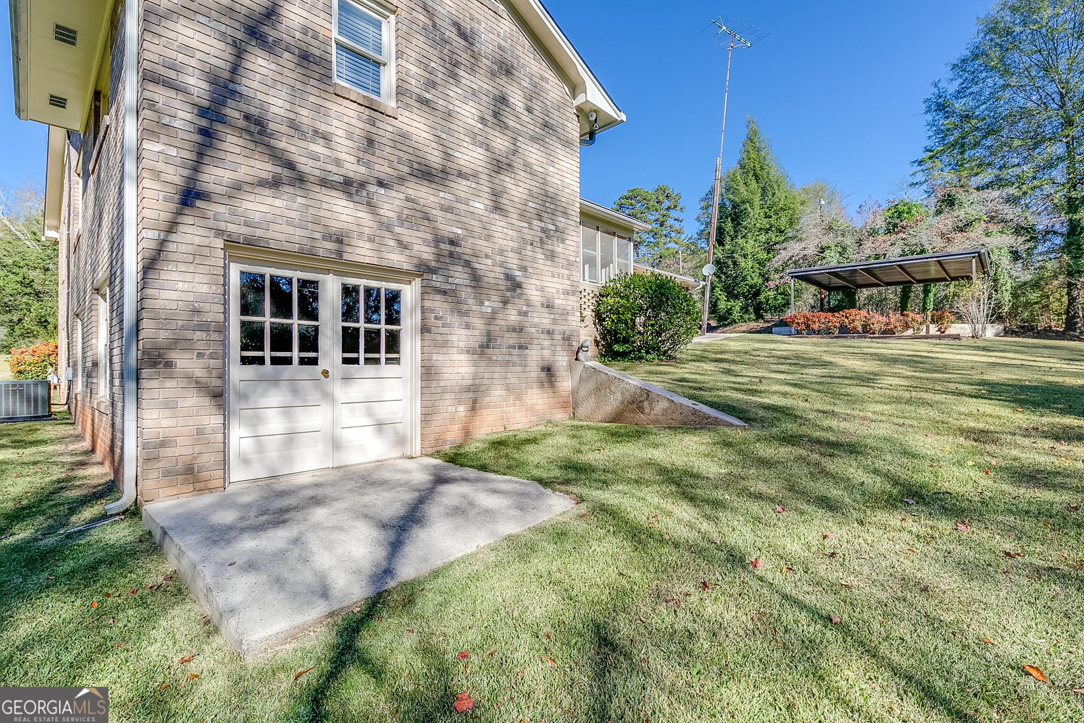 1174 Hospital Road Commerce, GA 30529 - Photo 34 of 40 a backyard of a house with lots of green space