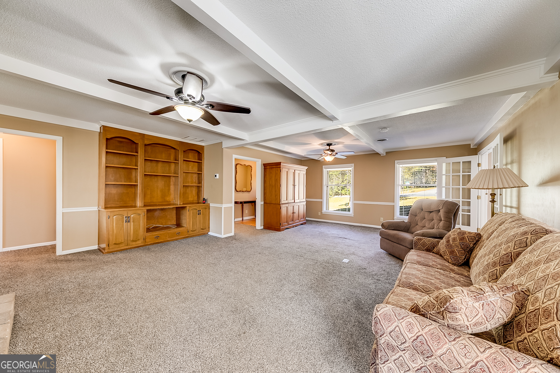 1174 Hospital Road Commerce, GA 30529 - Photo 9 of 40 a living room with furniture and a ceiling fan